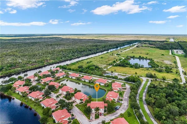 $310,000 | 25110 Peacock Lane, Unit 201, Naples, FL 34114