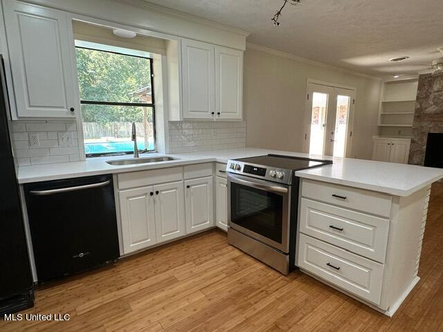 126 Colonial Circle Jackson, MS 39211 - Photo 4 of 33 New stainless smoothtop range and sink