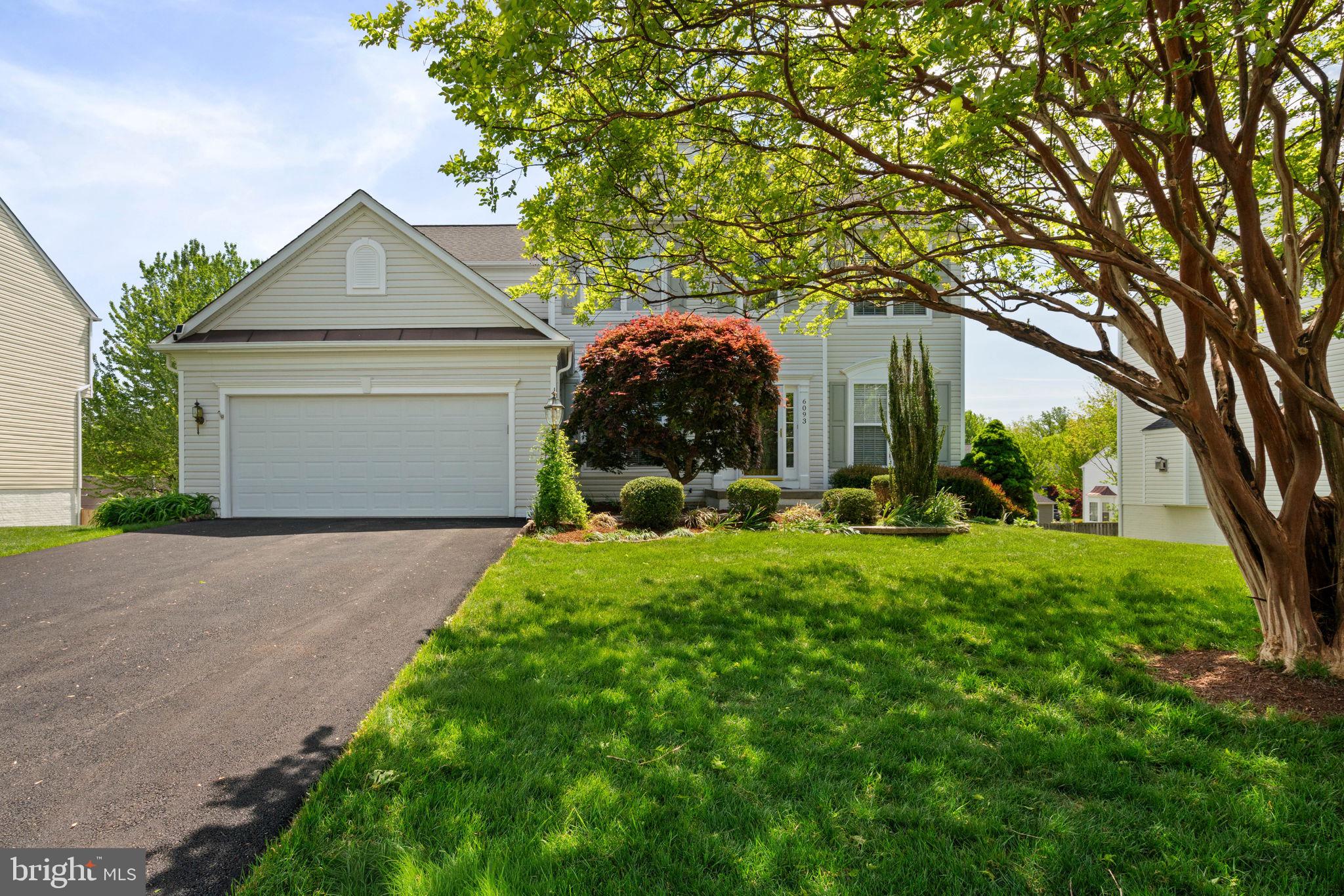 6093 Spindle Tree Court Woodbridge, VA 22193 - Photo 2 of 51 Charming home with lush greenery.