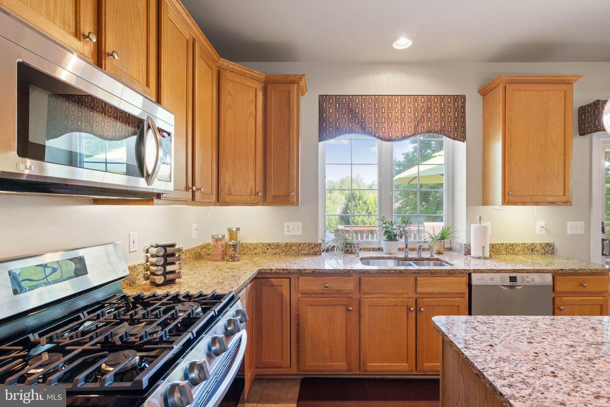 6093 Spindle Tree Court Woodbridge, VA 22193 - Photo 24 of 51 Bright kitchen with warm wood accents.