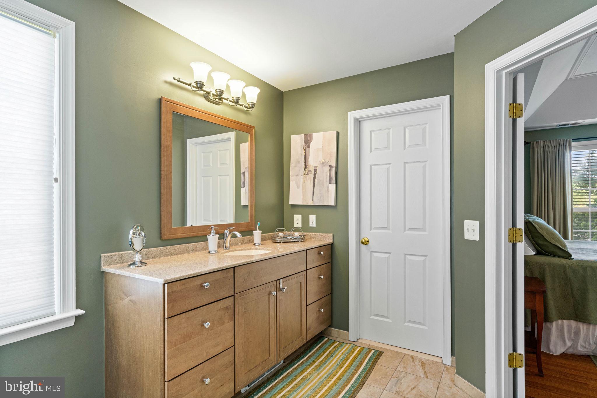 6093 Spindle Tree Court Woodbridge, VA 22193 - Photo 34 of 51 Serene bathroom with modern touches.