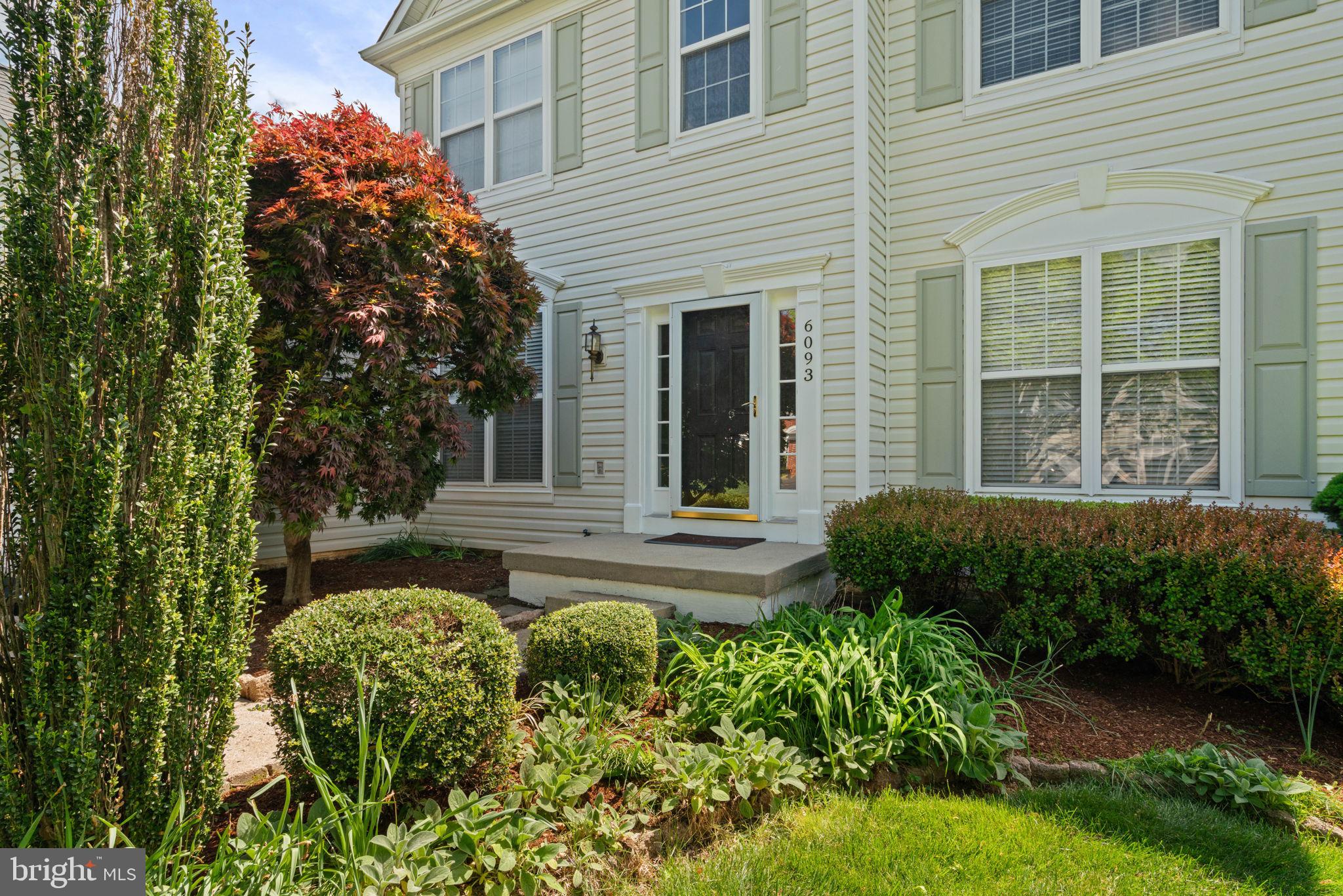6093 Spindle Tree Court Woodbridge, VA 22193 - Photo 5 of 51 Charming entrance with lush greenery.
