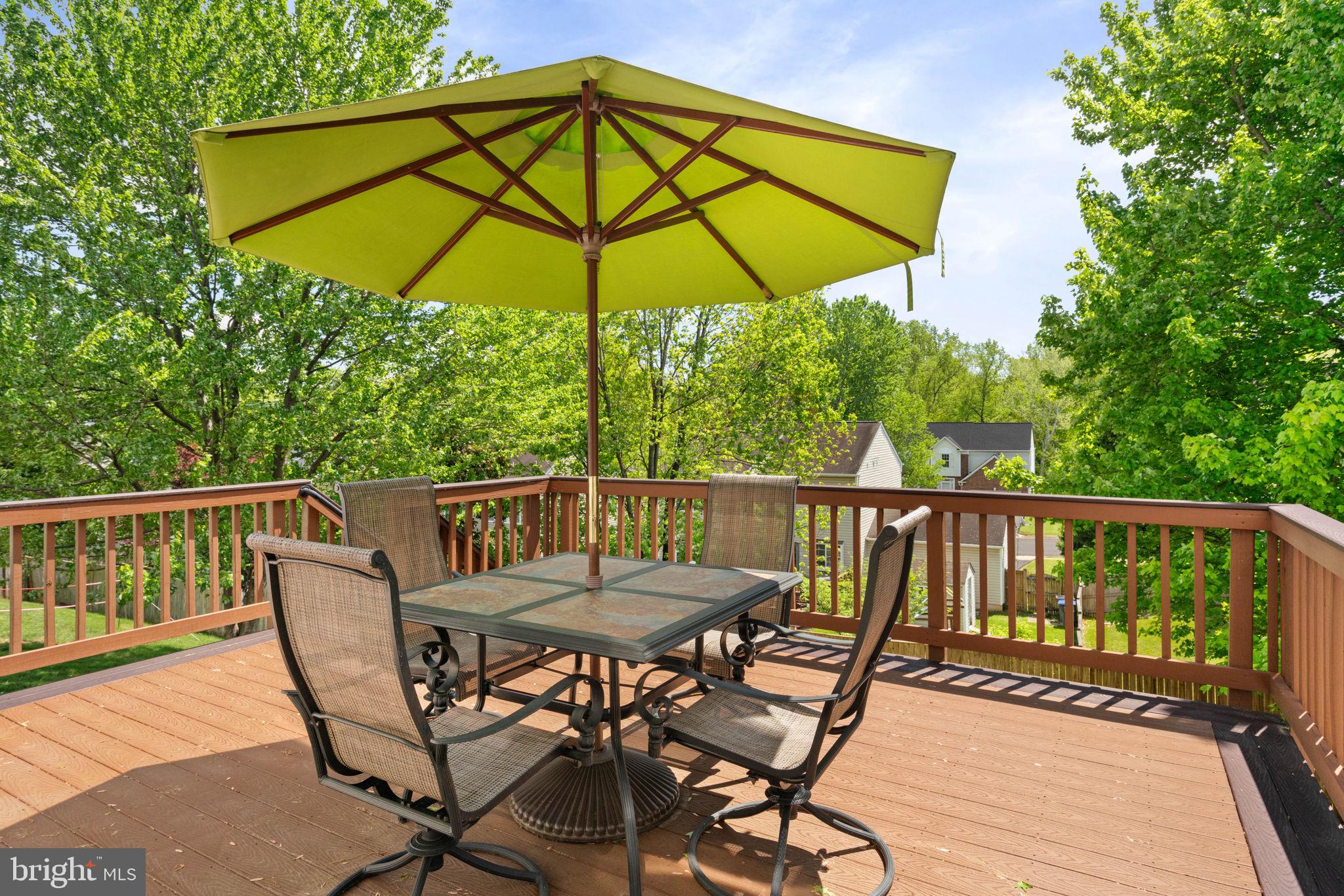 6093 Spindle Tree Court Woodbridge, VA 22193 - Photo 6 of 51 Sunny deck with vibrant umbrella.