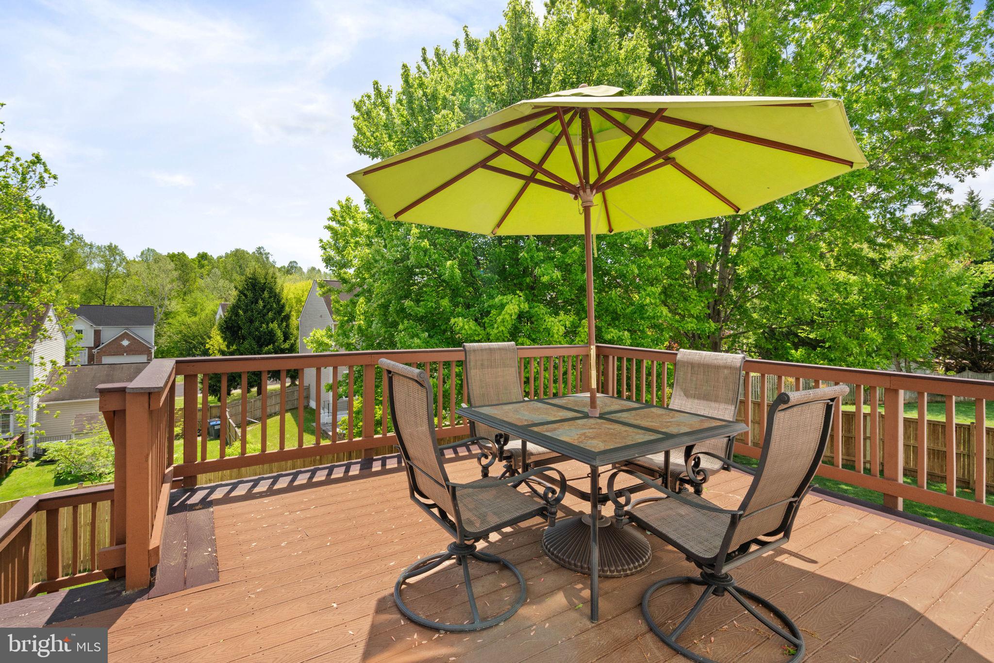 6093 Spindle Tree Court Woodbridge, VA 22193 - Photo 7 of 51 Sunny deck with vibrant umbrella.