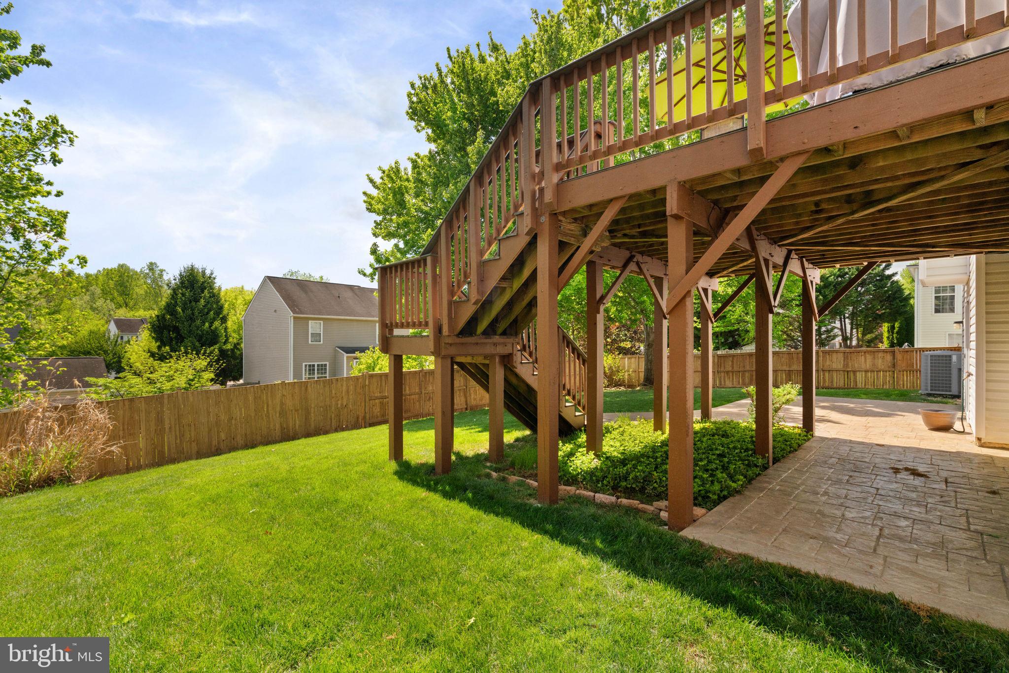 6093 Spindle Tree Court Woodbridge, VA 22193 - Photo 8 of 51 Spacious backyard with elevated deck.