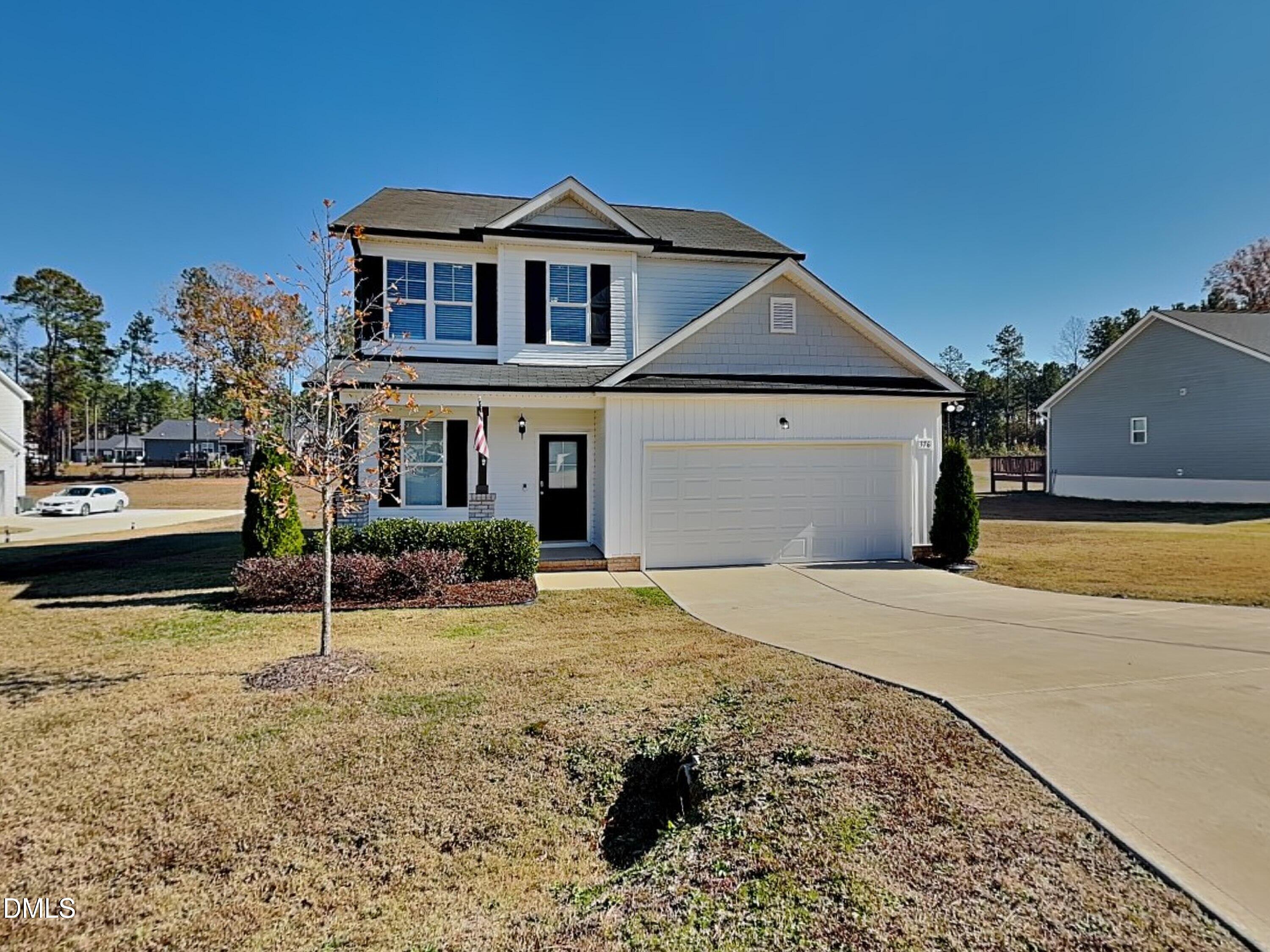a house view with a garden space