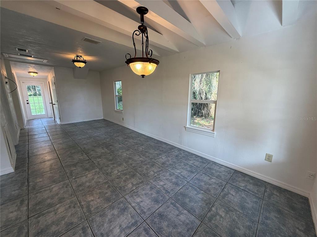 102 Possum Hollow Road Georgetown, FL 32139 - Photo 15 of 24 an empty room with windows and fan