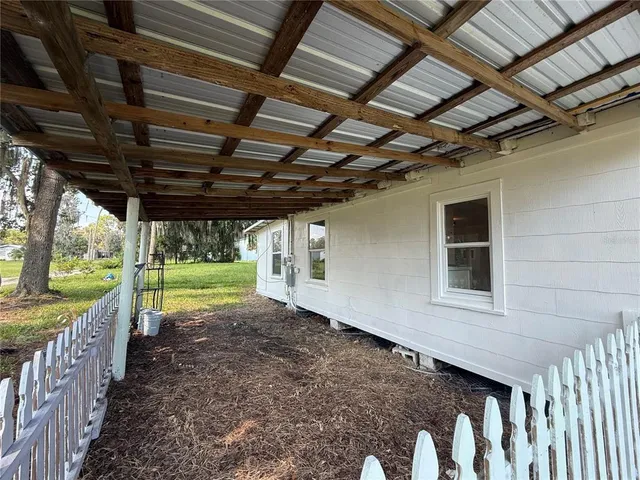 a view of a backyard of a house