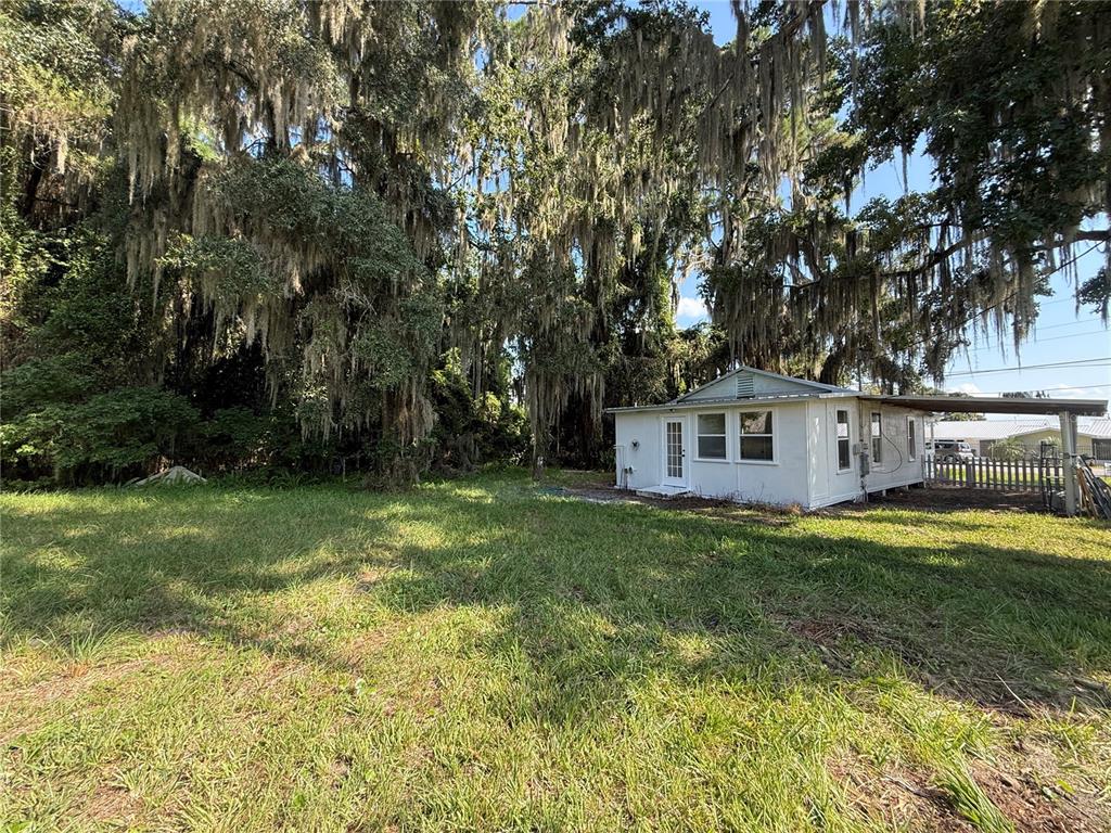 102 Possum Hollow Road Georgetown, FL 32139 - Photo 8 of 24 a front view of a house with a yard