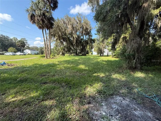 a view of outdoor space and yard