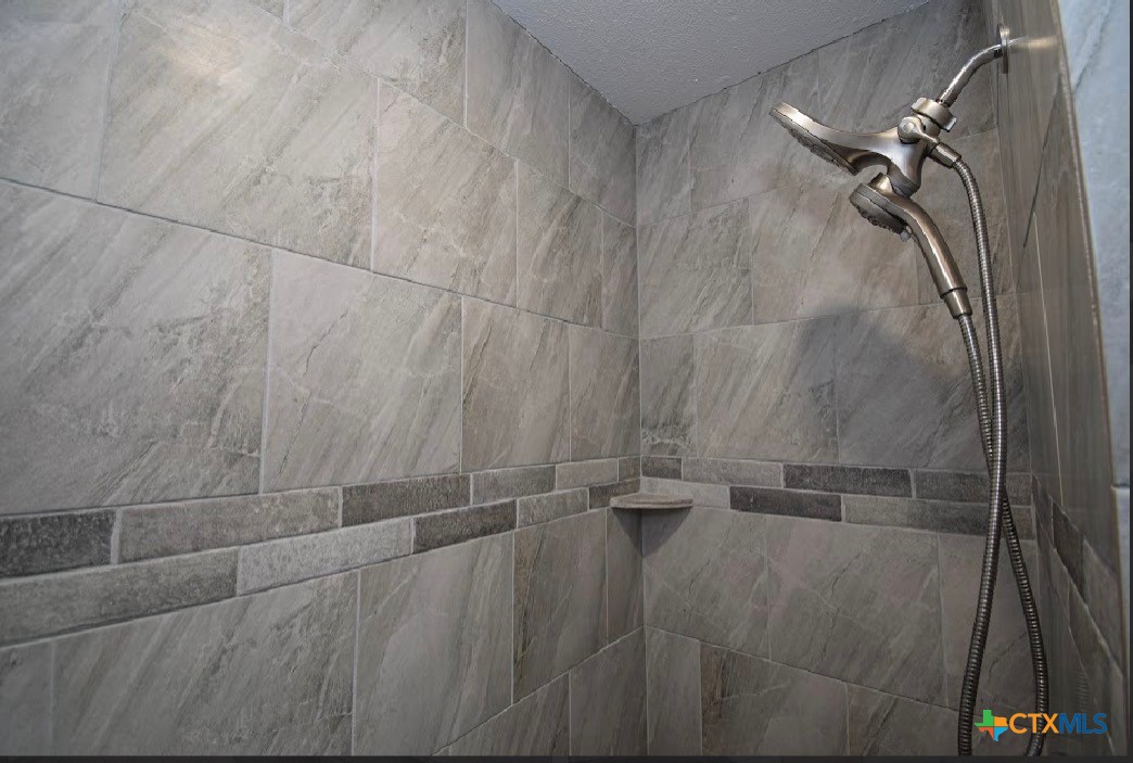 205 Tanglewood Road Temple, TX 76502 - Photo 17 of 26 Walk In Tile Shower