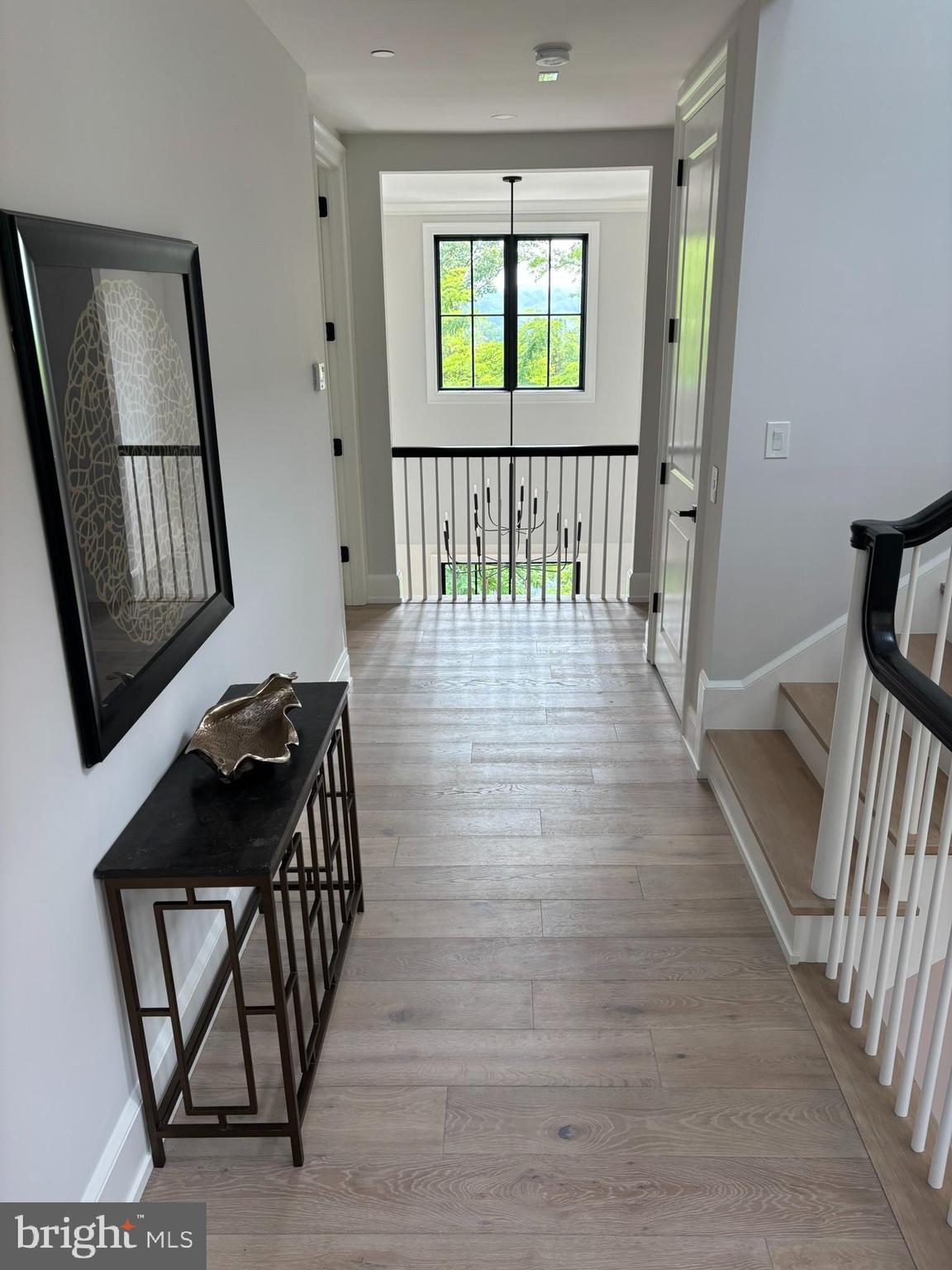5017 Eskridge Terrace Northwest Washington, DC 20016 - Photo 15 of 45 a view of entryway with wooden floor