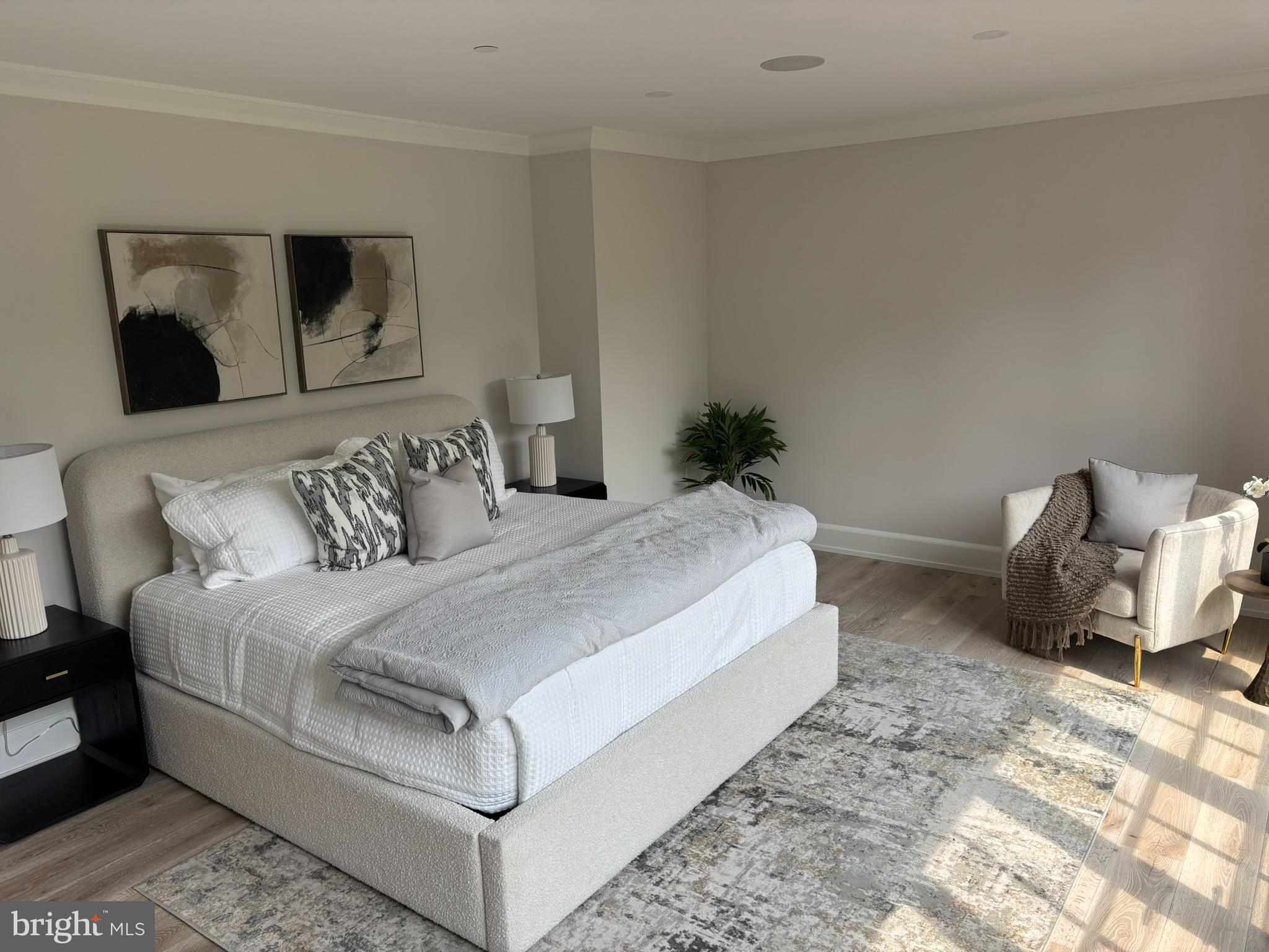 5017 Eskridge Terrace Northwest Washington, DC 20016 - Photo 17 of 45 a spacious bedroom with a bed and couch