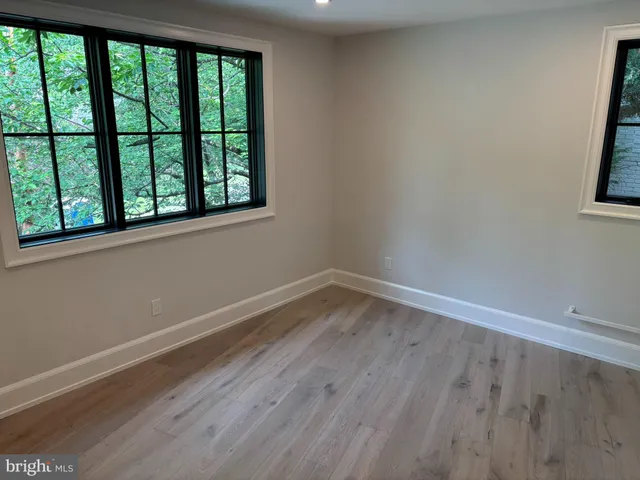 a view of a room that has a window