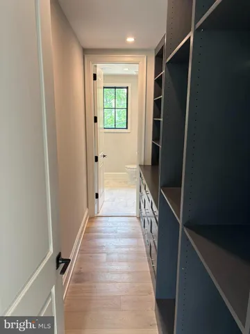a bathroom with a sink toilet and mirror