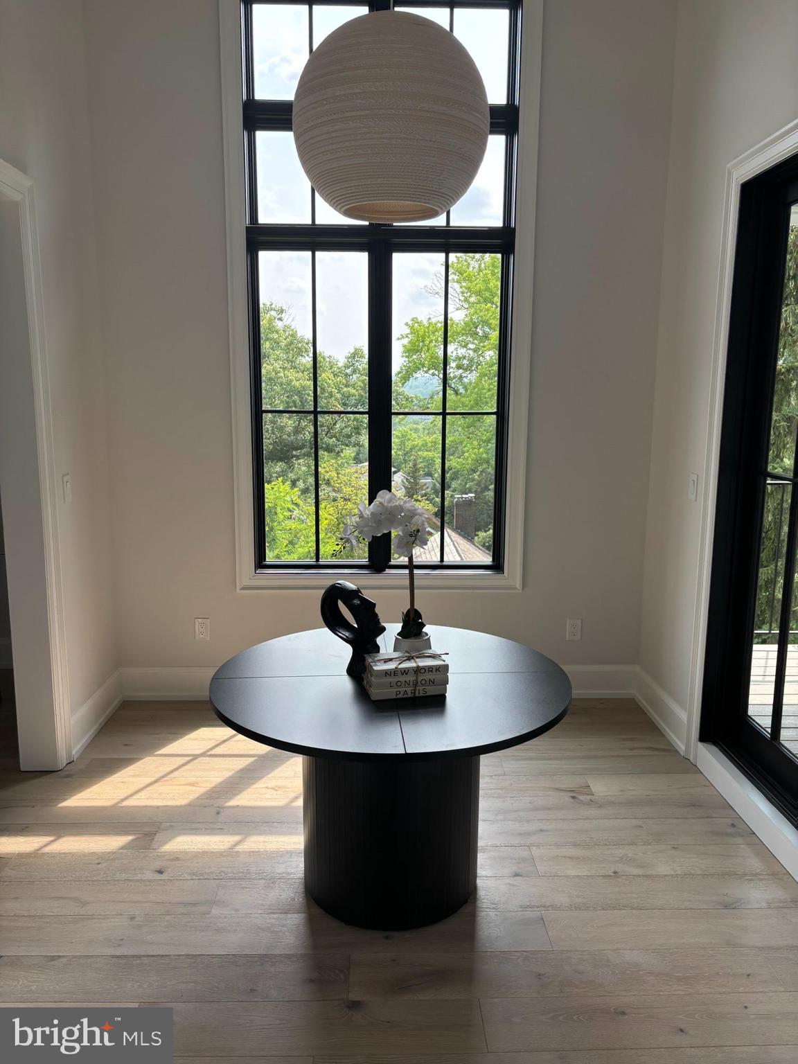 5017 Eskridge Terrace Northwest Washington, DC 20016 - Photo 31 of 45 a dining room with table and chairs