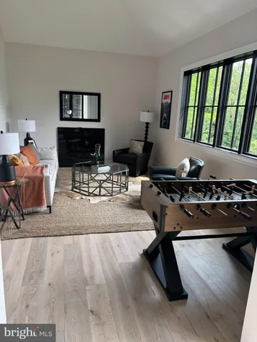 a view of wooden floor in an empty room