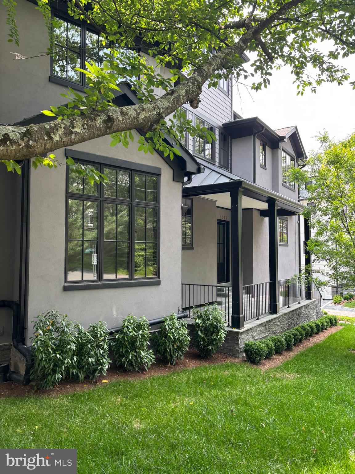 5017 Eskridge Terrace Northwest Washington, DC 20016 - Photo 45 of 45 front view of a house with a yard