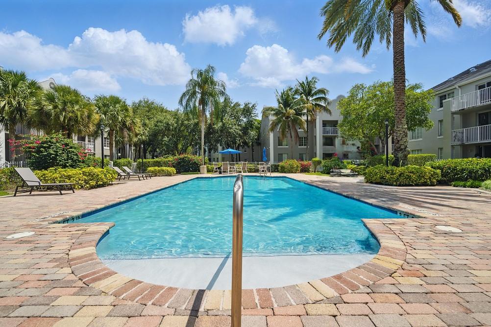 11133 Southwest 8th Street, Unit 306 Pembroke Pines, FL 33025 - Photo 14 of 14 a view of a backyard