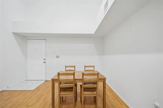 a room with a table and chairs