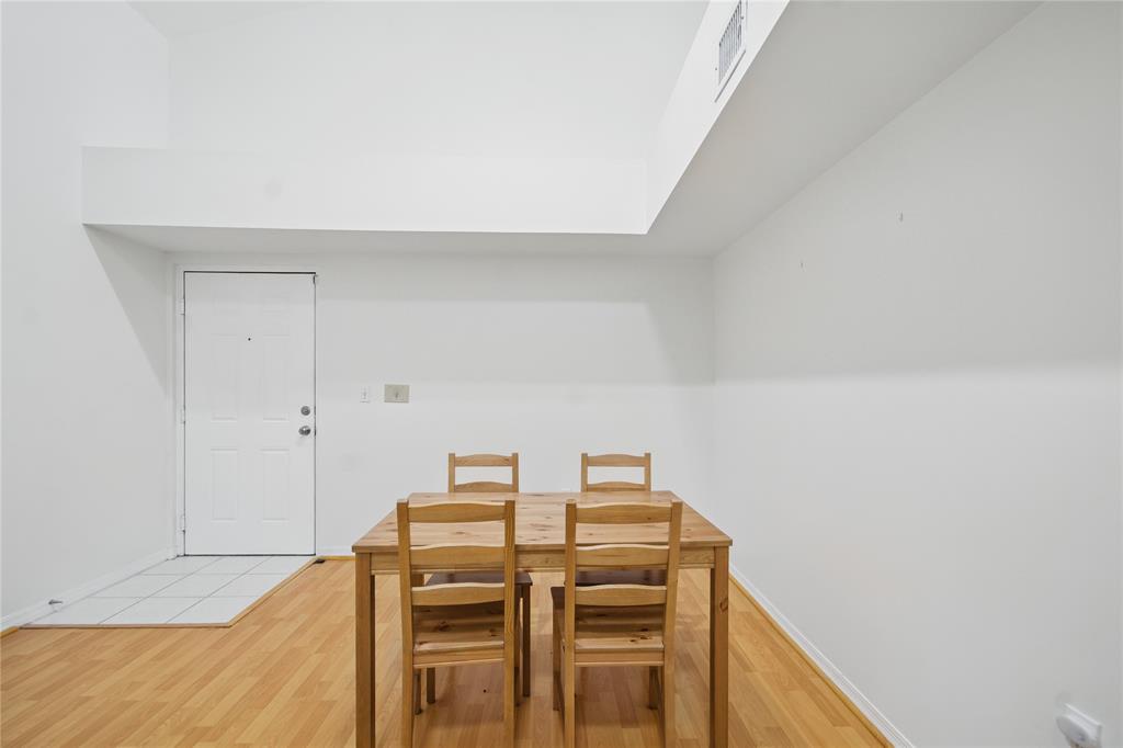 11133 Southwest 8th Street, Unit 306 Pembroke Pines, FL 33025 - Photo 6 of 14 a room with a table and chairs