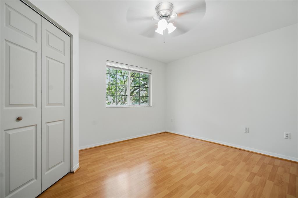 11133 Southwest 8th Street, Unit 306 Pembroke Pines, FL 33025 - Photo 10 of 14 an empty room with a window
