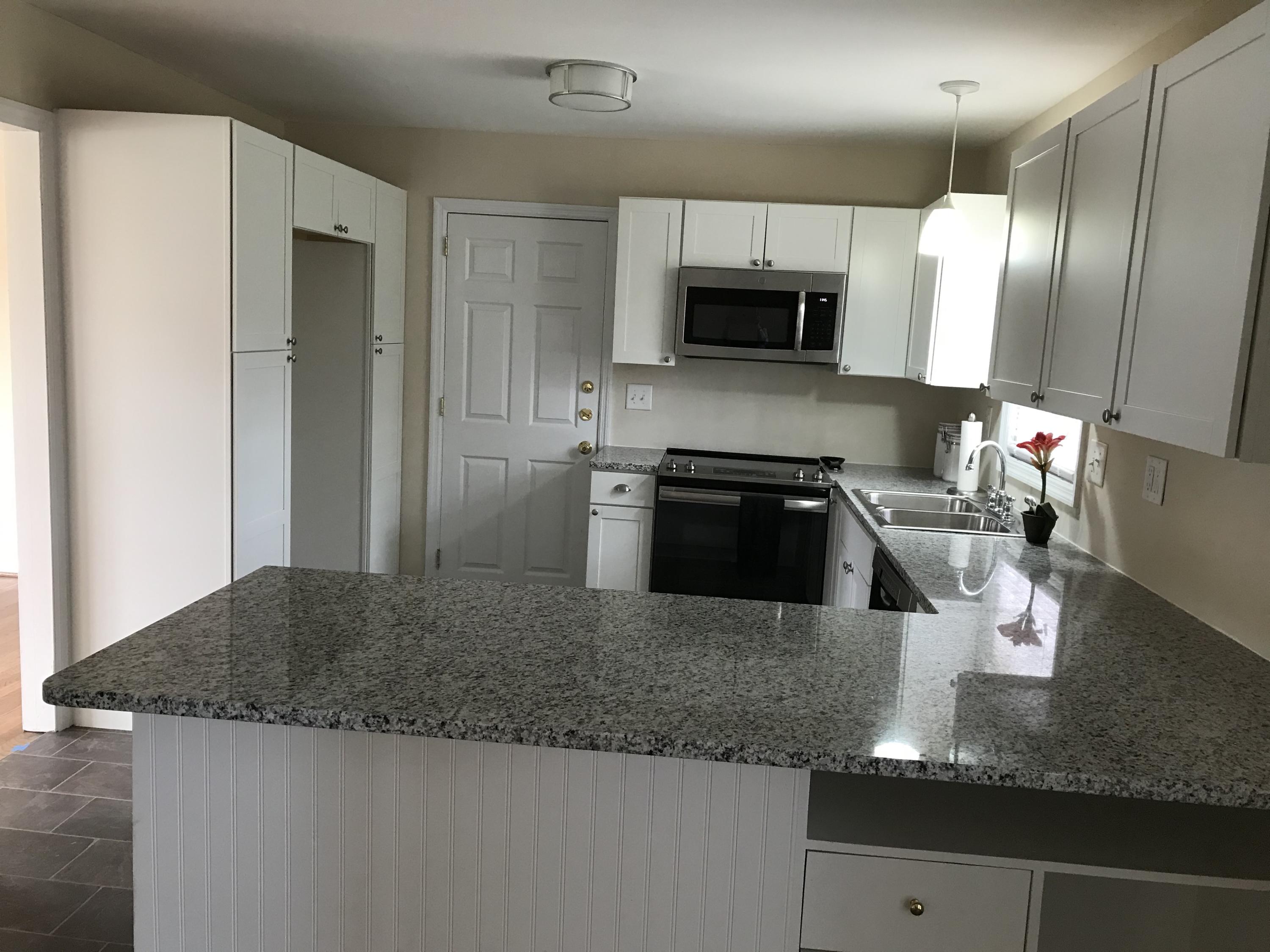55 Boardman Road Charleston, SC 29407 - Photo 24 of 27 Granite Countertops and breakfast bar