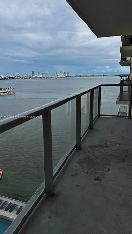 a kitchen with a stove and cabinets