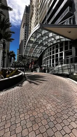 a view of a car park in front of a building