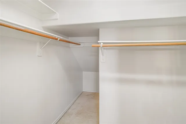 a view of an empty walk in closet
