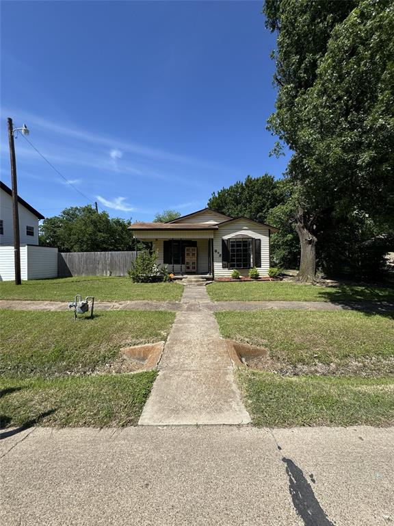 803 Ripley Avenue Ennis, TX 75119 - Photo 1 of 40 Single-story residence featuring a covered front porch and a paved walkway