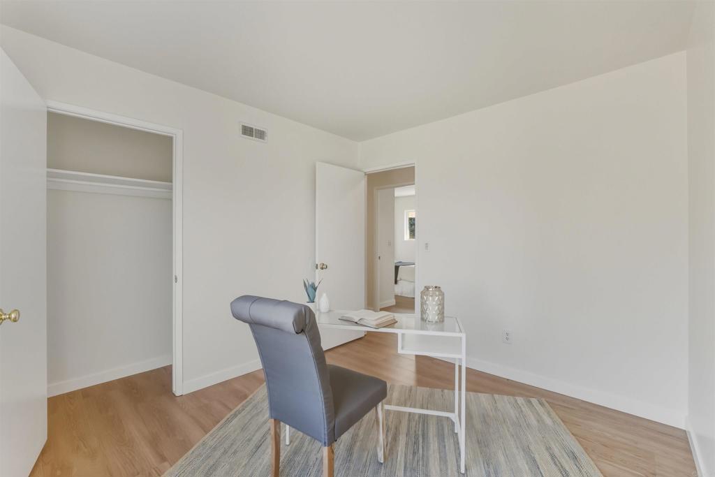 9909 Halberns Boulevard Santee, CA 92071 - Photo 20 of 35 a dining room with furniture and wooden floor