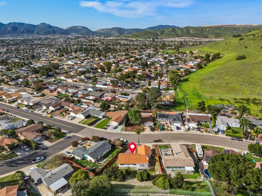 9909 Halberns Boulevard Santee, CA 92071 - Photo 33 of 35 an aerial view of residential houses with outdoor space and ocean view