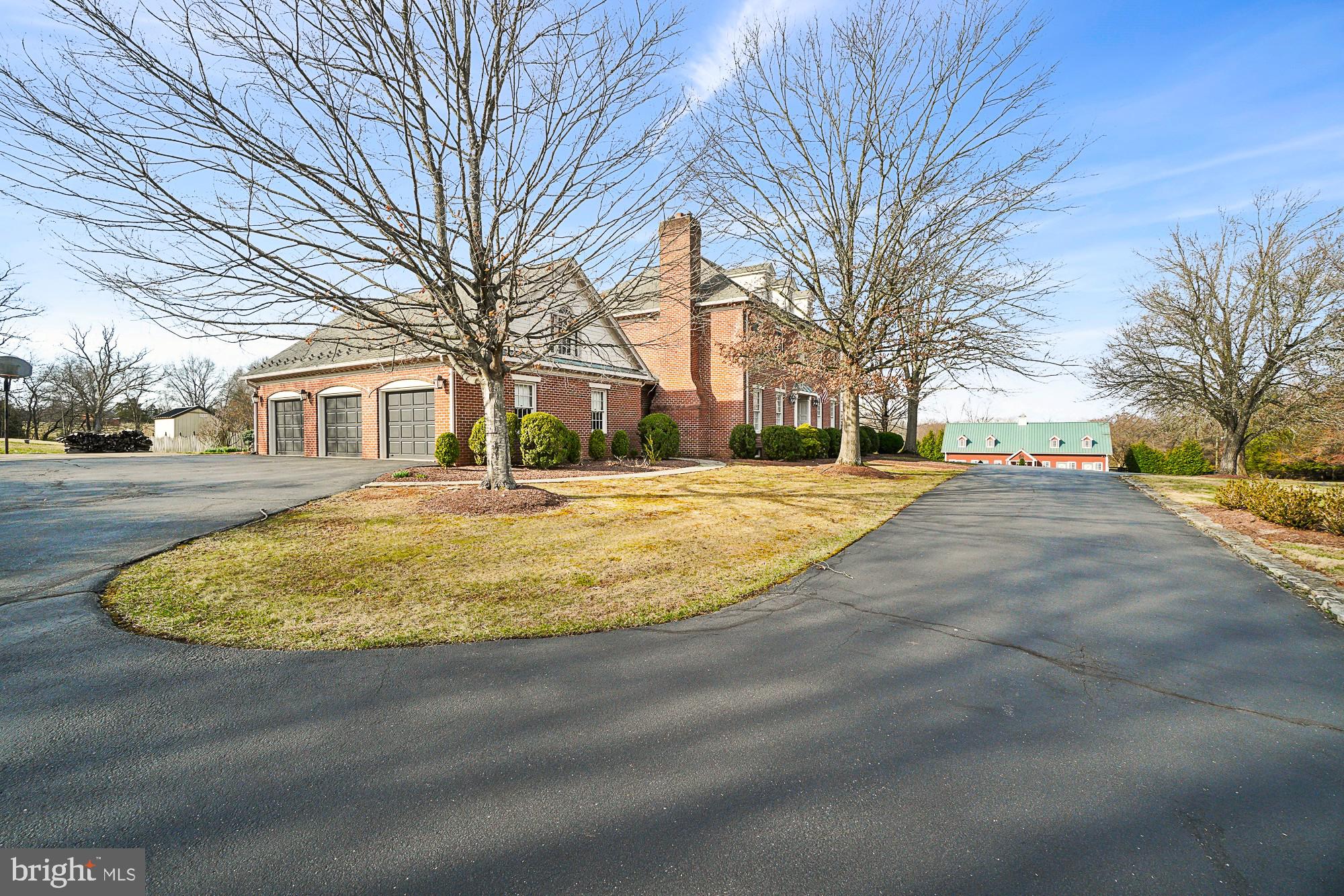 14920 Mount Nebo Road Poolesville, MD 20837 - Photo 5 of 135 a swimming pool with trees in front of it