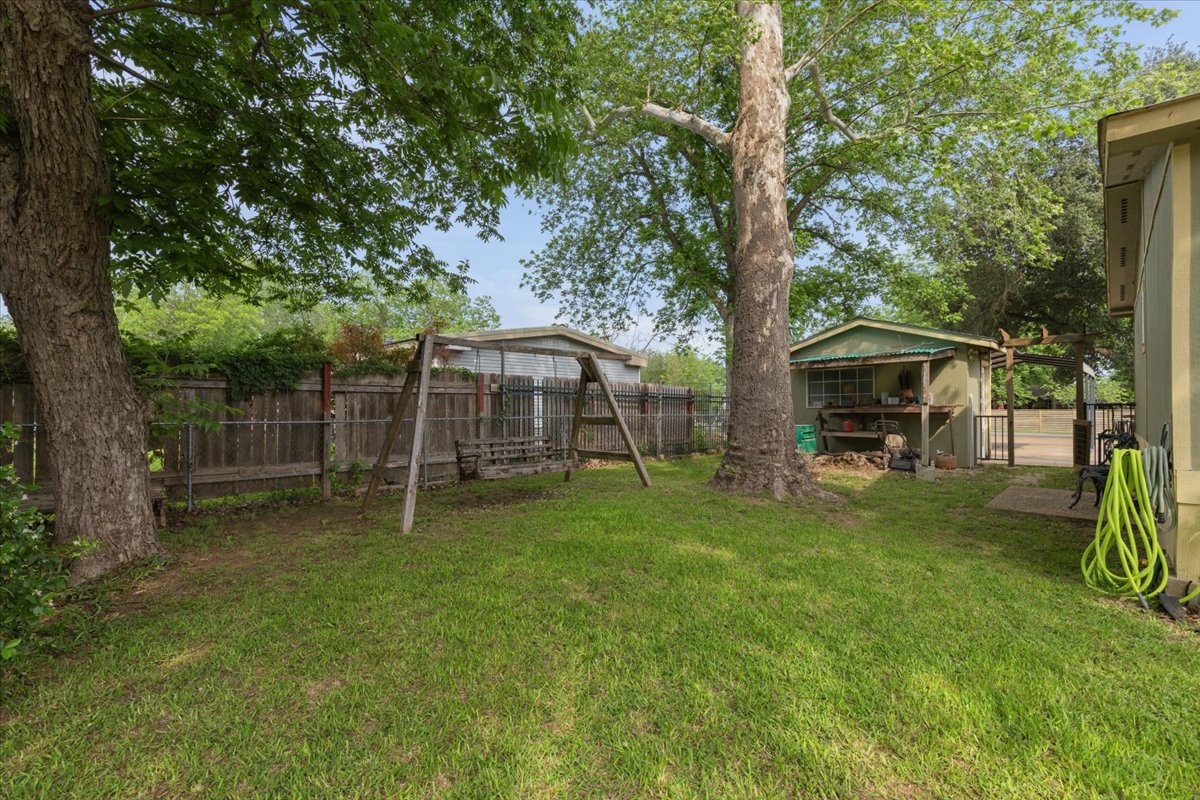 3122 River Road Cedar Creek, TX 78612 - Photo 26 of 37 Side yard showing Store Room 7 1/2'x13'