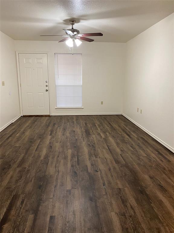 1110 Williams, Unit A Cleburne, TX 76033 - Photo 5 of 6 wooden floor in a room