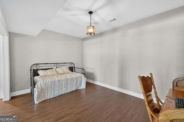 a outdoor living space with furniture and a potted plant