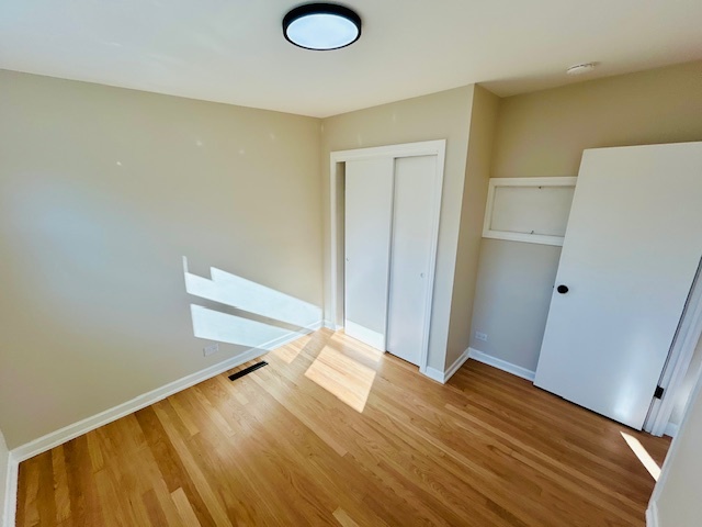 768 North Rohde Avenue Hillside, IL 60162 - Photo 13 of 20 a view of empty room with wooden floor
