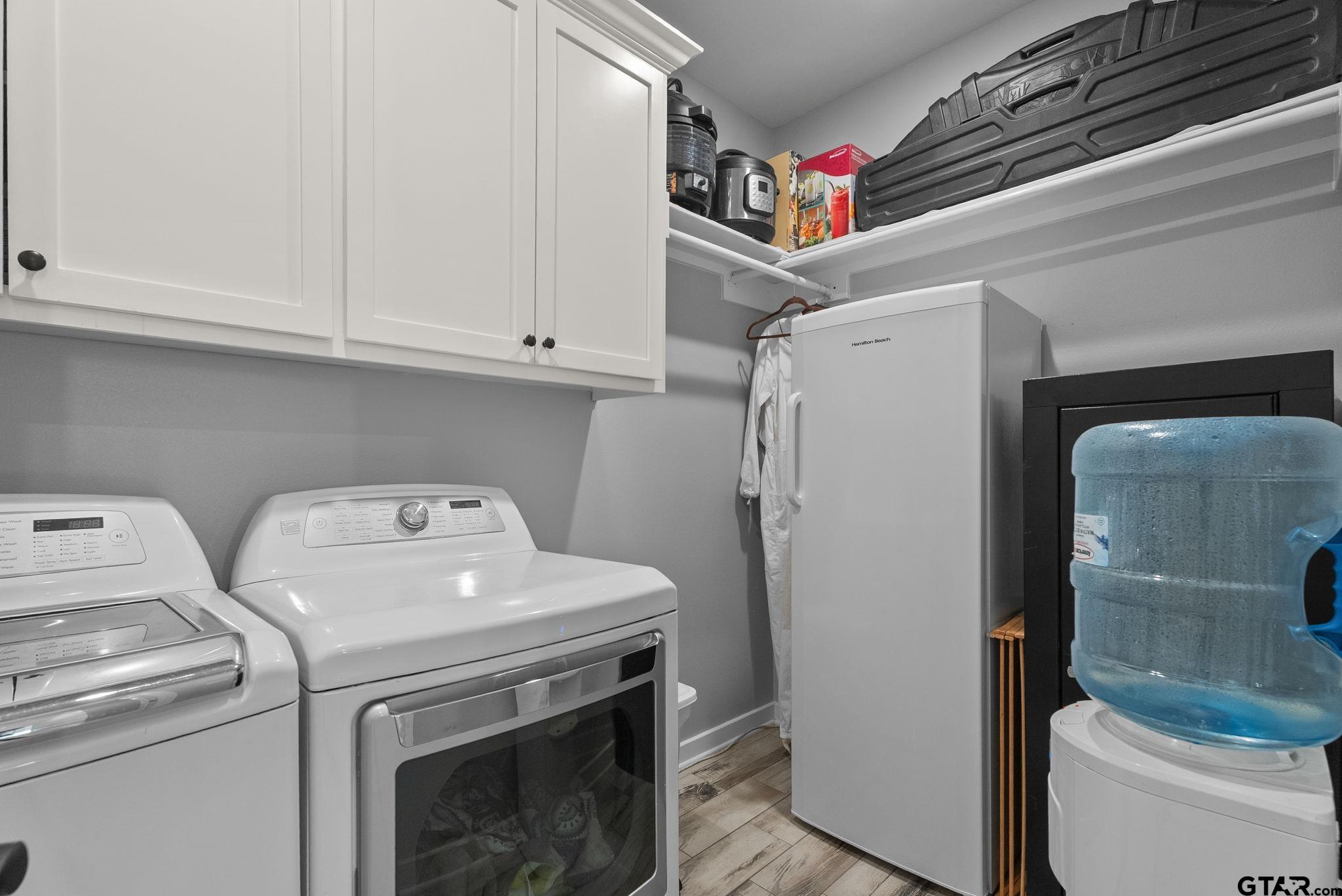 14543 Fallow Lane Tyler, TX 75706 - Photo 25 of 32 a utility room with dryer and washer