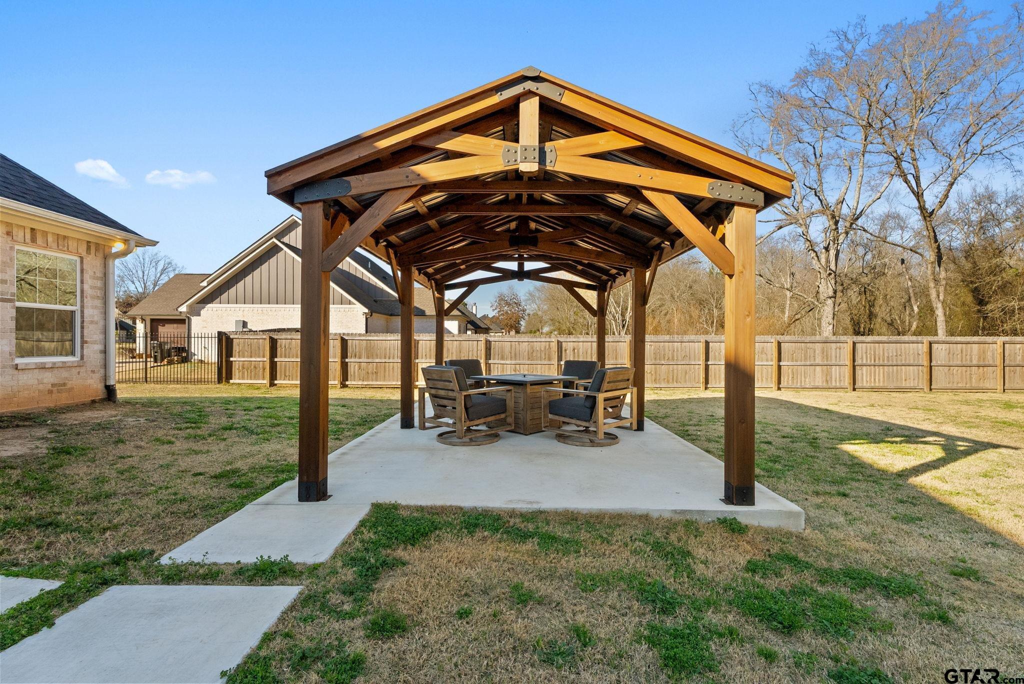 14543 Fallow Lane Tyler, TX 75706 - Photo 27 of 32 a view of a house with backyard and sitting area