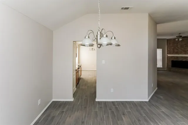 a view of a livingroom with wooden floor