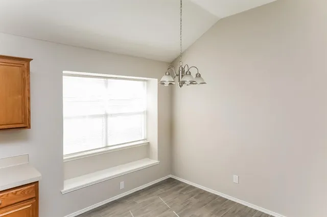 a view of a room with a window