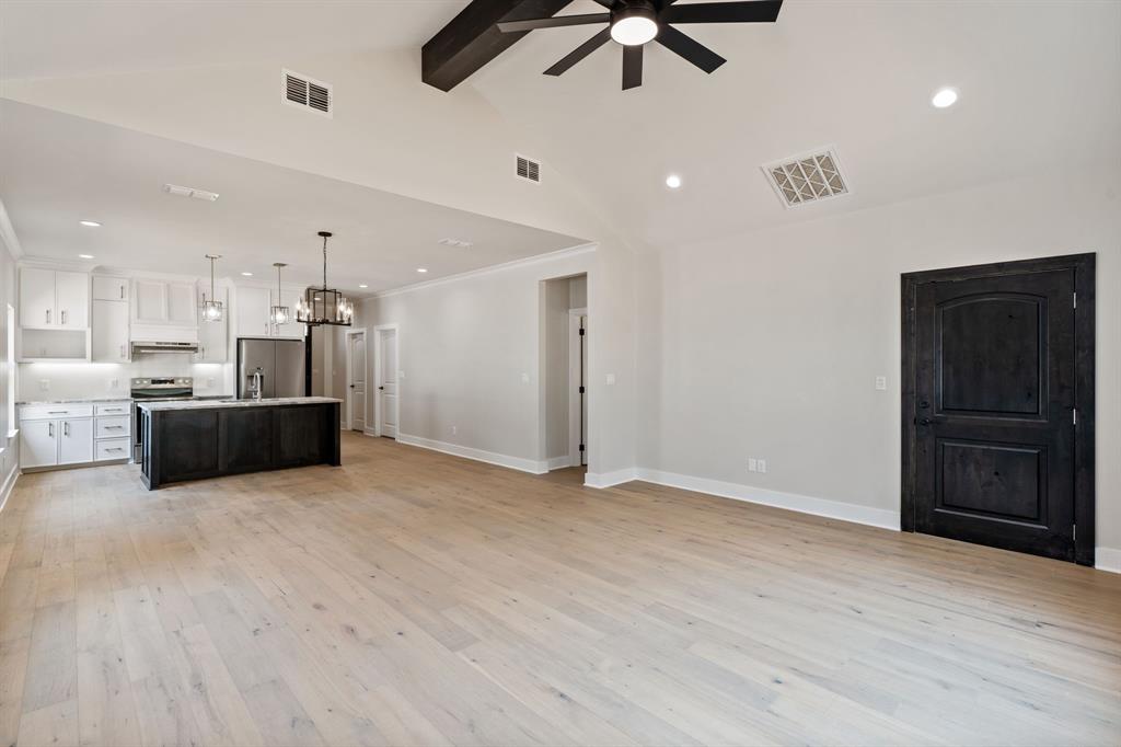 335 Perdanales Bullard, TX 75757 - Photo 20 of 37 a view of a kitchen with a sink and a refrigerator