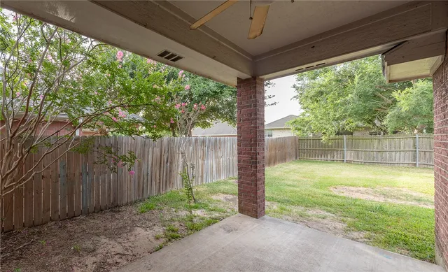 a view of a porch with a tree