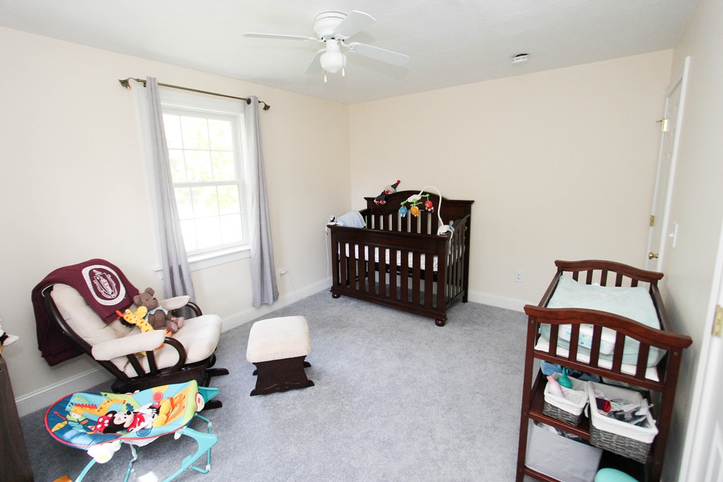 7 Middle Road Amesbury, MA 01913 - Photo 15 of 25 a bedroom with furniture and a window