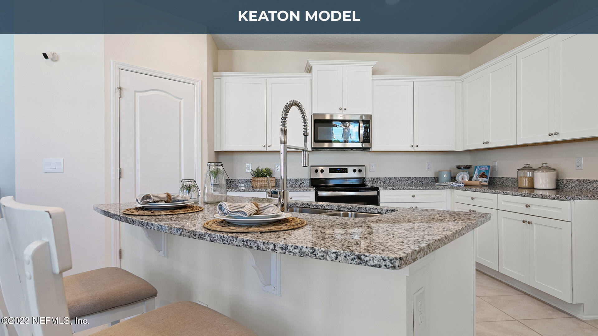 142 Seaport Breeze Road St. Augustine, FL 32095 - Photo 1 of 34 a kitchen with stainless steel appliances granite countertop a sink stove and cabinets