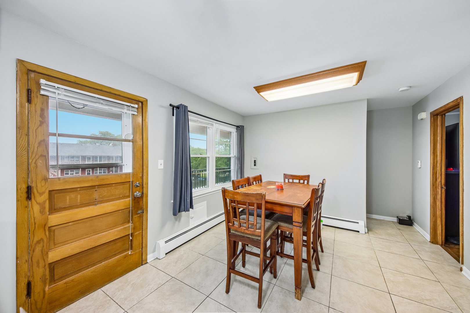 1855 Parkside Drive, Unit 8 Park Ridge, IL 60068 - Photo 11 of 22 a view of a room with furniture and a window
