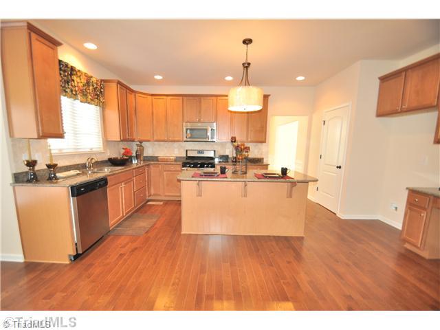 3153 Cranberry Ridge Drive High Point, NC 27265 - Photo 2 of 16 Kitchen. Spacious eat-in Kitchen offers all the upgrades you desire - granite, stainless steel and an island!