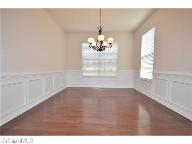 3153 Cranberry Ridge Drive High Point, NC 27265 - Photo 6 of 16 Dining Room. Formal Dining Room highlighted by hardwood floors and chair rail/boxes for a richer, elegant look. A great place to entertain guests!