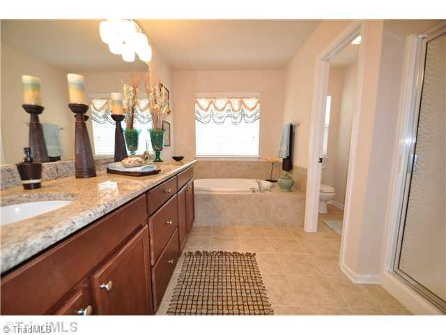 3153 Cranberry Ridge Drive High Point, NC 27265 - Photo 8 of 16 Master Bath/Spa. His & Her vanities and new granite countertop.
